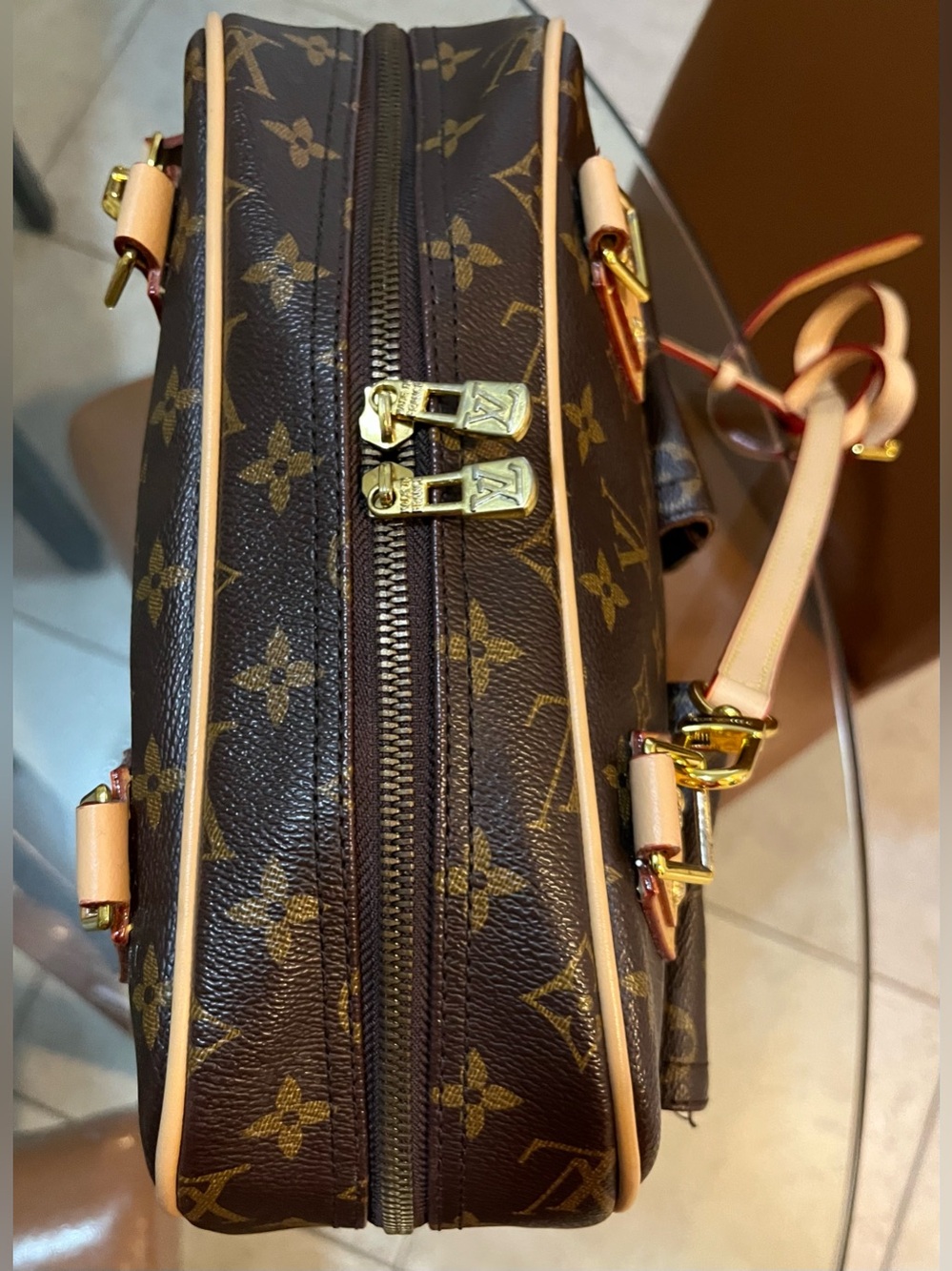 Gorgeous Monogram bag in rich brown & tan with gold tone hardware .